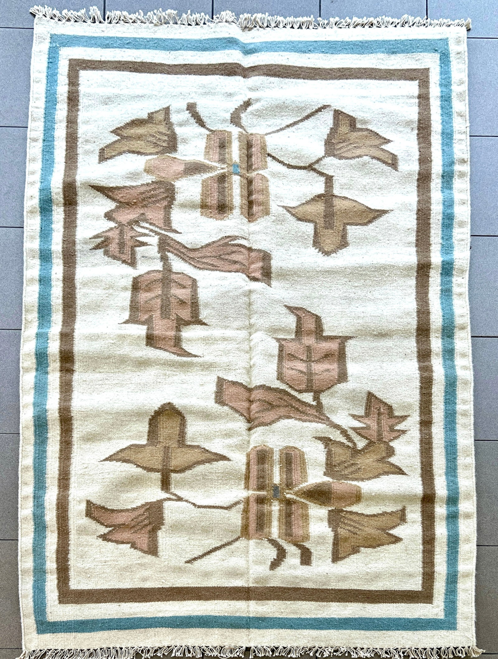 SCANDINAVIAN FLAT WEAVE KILIM RUG: Dimensions: H 6' x W 4'. Vintage Scandinavian flat weave kilim rug with floral pattern.