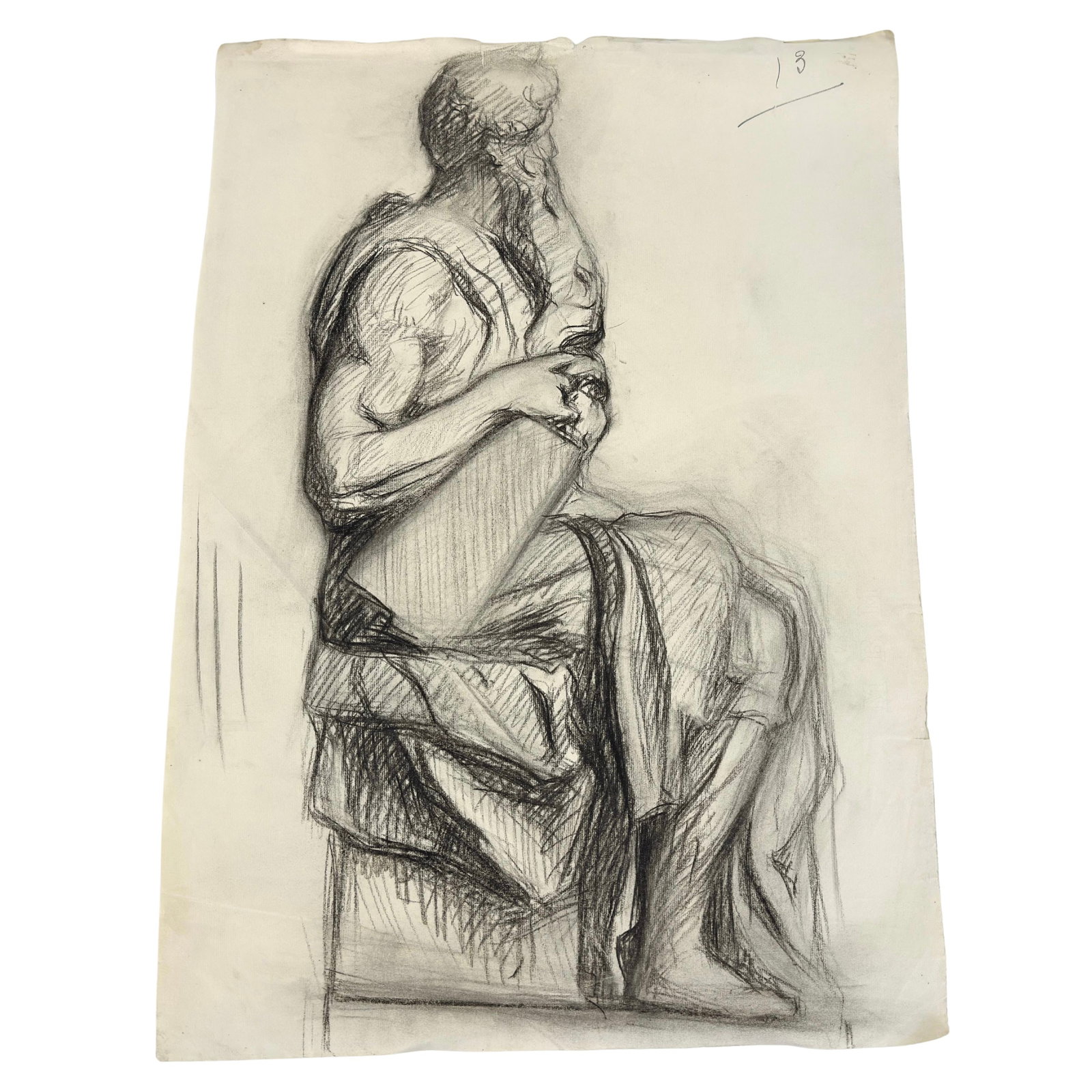 VINTAGE CHARCOAL DRAWING: Dimensions: H 24.7” x W 17”. Charcoal painting of a seated figure, unframed. Unsigned. (73)