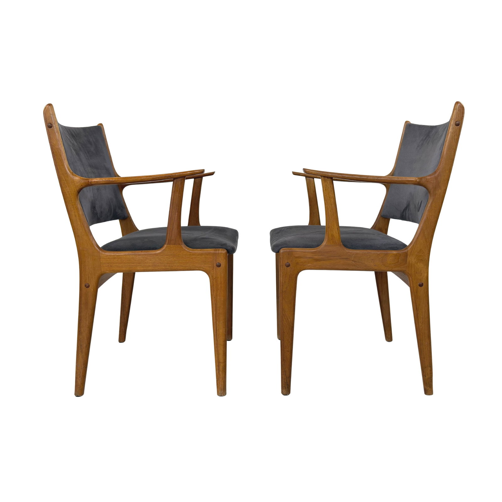 JOHANNES ANDERSEN ARMCHAIRS, A PAIR: Dimensions: H 33.5” x W 22.3” x D 22” x SH 18.5”. Pair of Danish armchairs designed by Johannes Andersen for Uldum Møbelfabrik in the 1960s, newly upholstered in dark gray