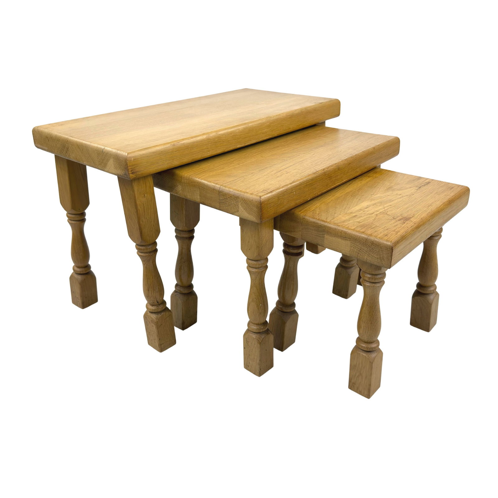 (3) NESTING TABLES MANNER KJAERNULFF: Dimensions: H 16” x W 24” x D 12”. Set of 3 Rustic carved oak nesting tables with turned legs. Dimensions: H 14 ” x W 17” x D 9”/ H 12.3” x W 10.5”.