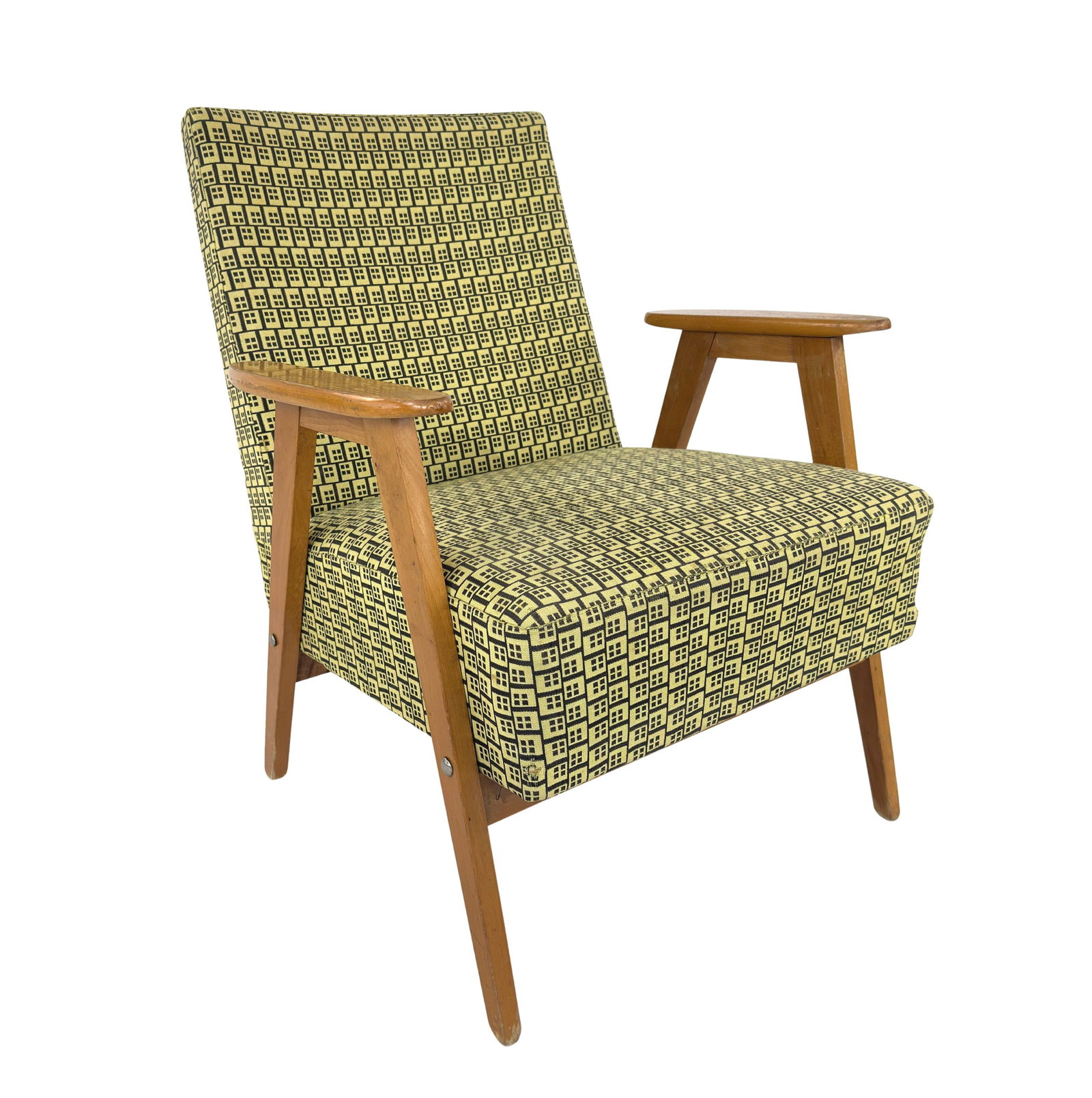 ARMCHAIR BY J. CHIEROWSKI, 1960s: Dimensions: H 31” x W 25” x D 29” x SH 17”. Vintage armchair designed by J. Chierowski in the 1960s with original yellow and black patterned fabric.