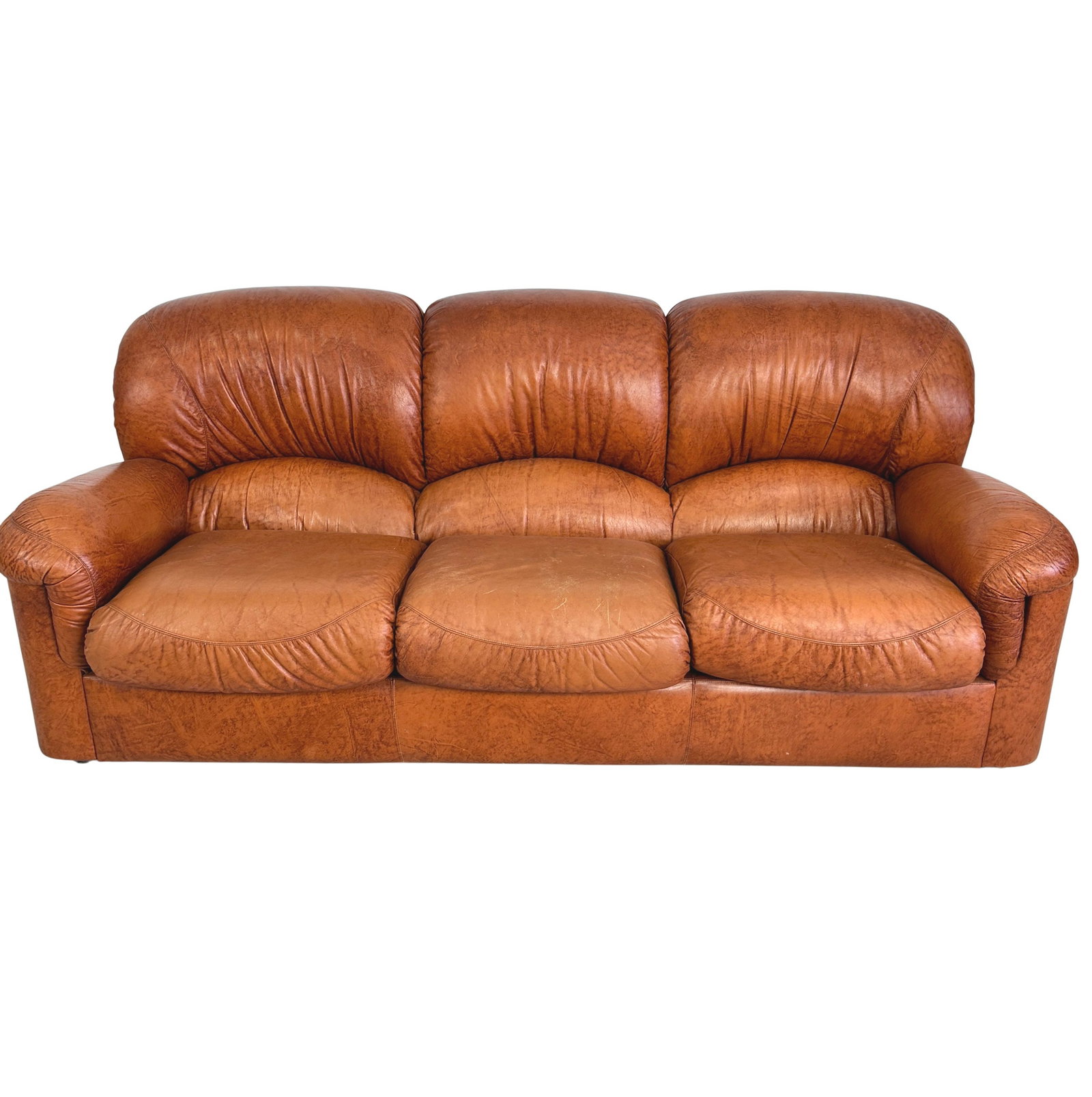 ITALIAN LEATHER SOFA, 1960s: Dimensions: H 34.5” x W 82” x D 36” x SH 19”. Vintage Italian brown leather three-seater sofa from the 1960s. Manifattura Italiana.
