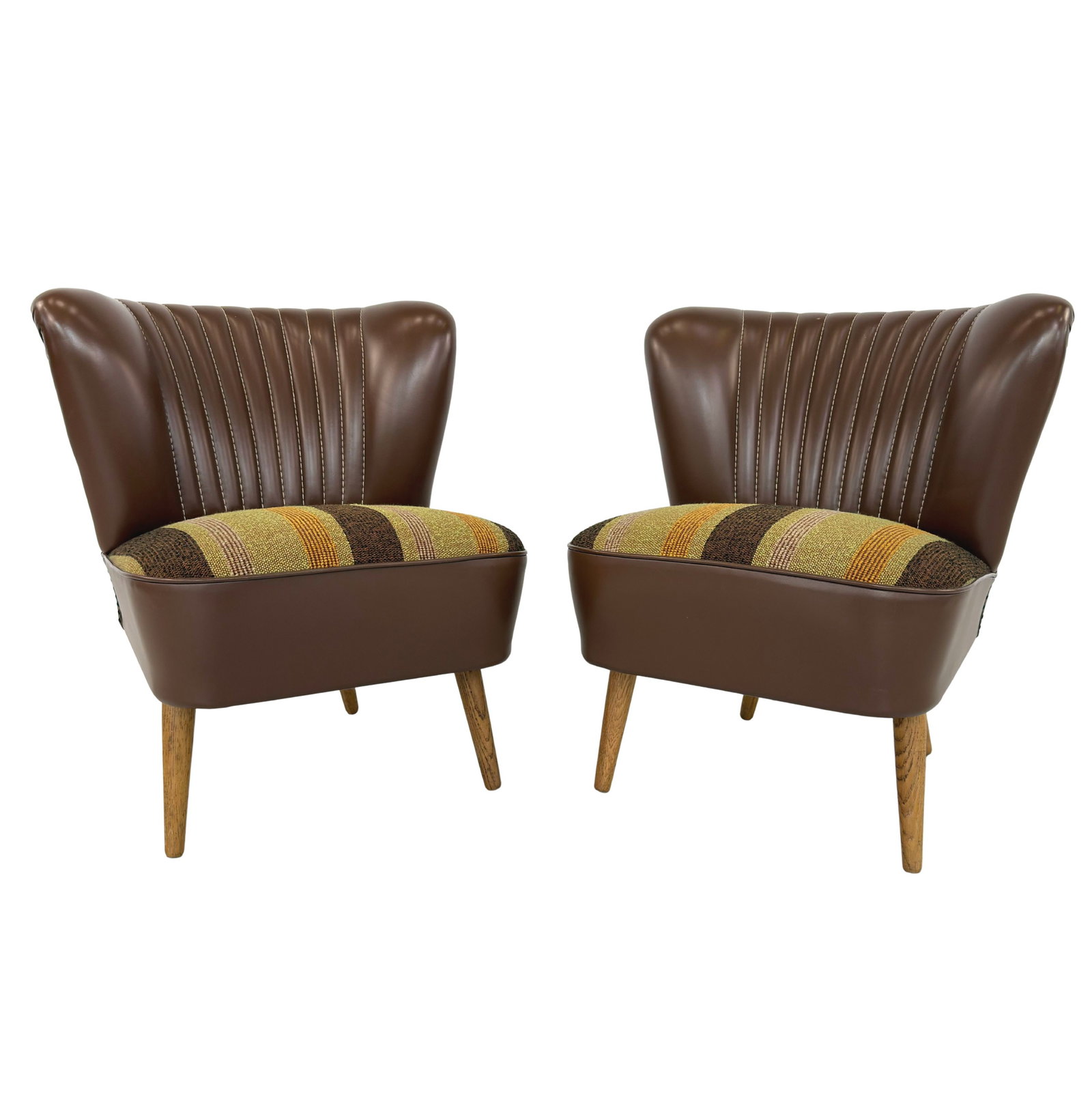 VINTAGE COCKTAIL CHAIRS, A PAIR: Dimensions: H 26” x W 20” x D 24.5” x SH 16.7”. Pair of Vintage Cocktail chairs in brown faux leather and striped fabric seats.