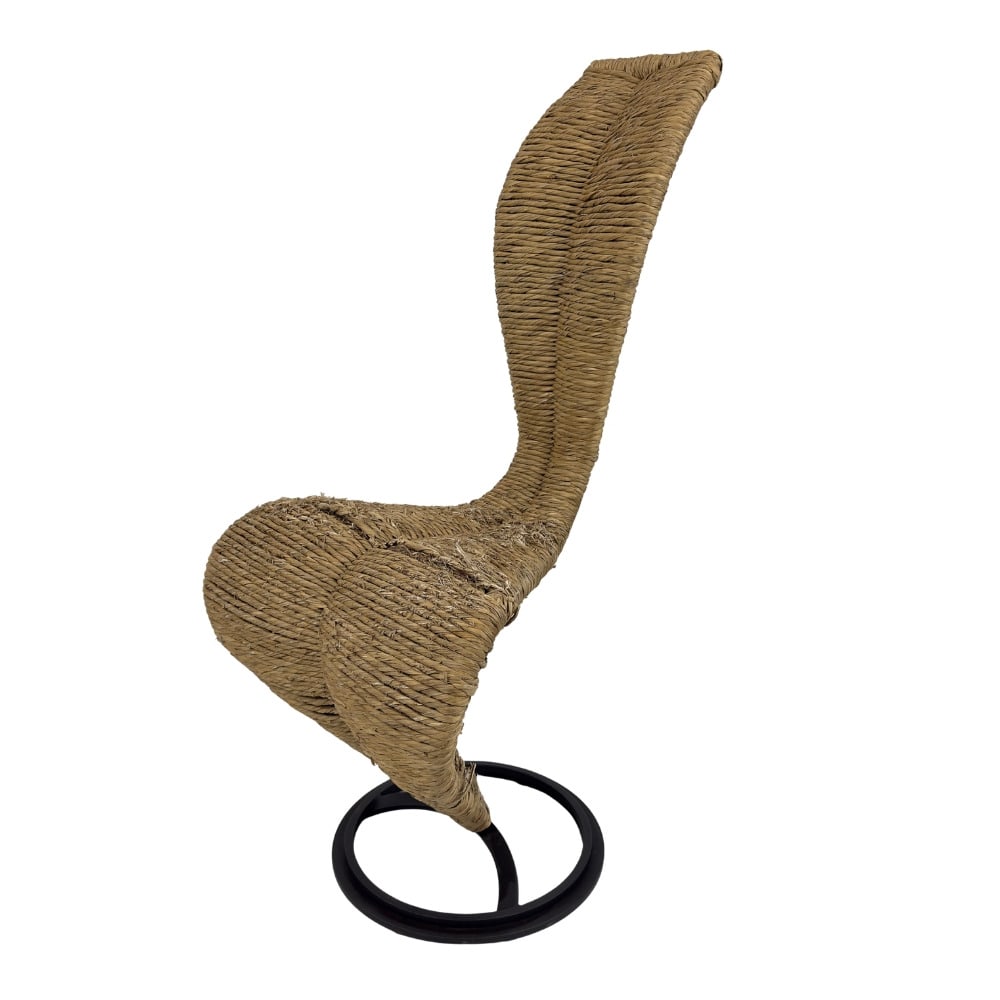 S CHAIR BY TOM DIXON FOR CAPPELLINI: Dimensions: H 40.5” x W 19” x D 22.5” x SH 20”. Italian “S Chair ” designed by Tom Dixon for Cappellini in the 1980s in hand-woven wicker on a black metal base.