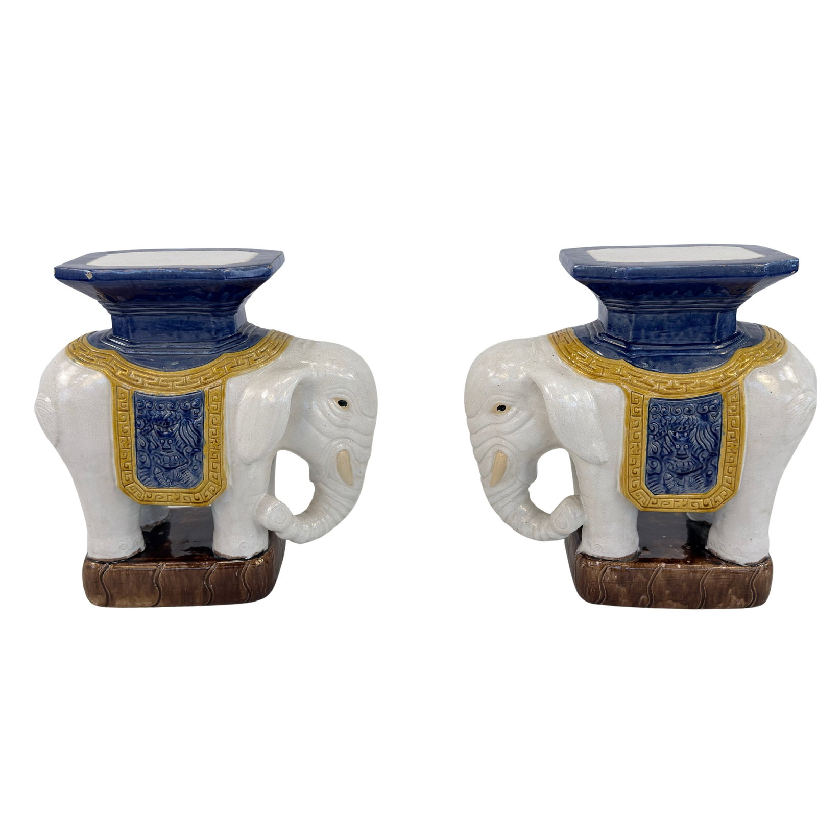 CERAMIC ELEPHANT PLANT STANDS, A PAIR: Dimensions: H 22.5” x W 21” x D 9.5”. Pair of Vintage Chinese hand painted ceramic Elephant pedestals / plant stands.