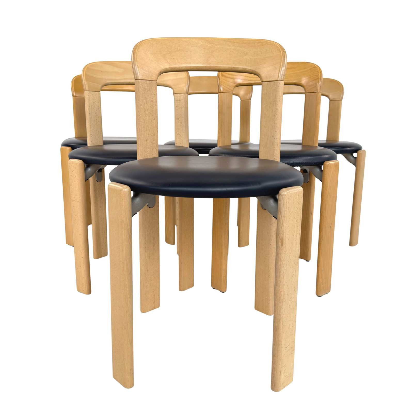 (6) BRUNO REY DINING CHAIRS, 1970s: Dimensions: H 31” x W 17.7” x D 18.5” x SH 18.3”. Set of 6 Vintage dining chairs by Bruno Rey for Dietiker Switzerland with dark blue faux leather seats.