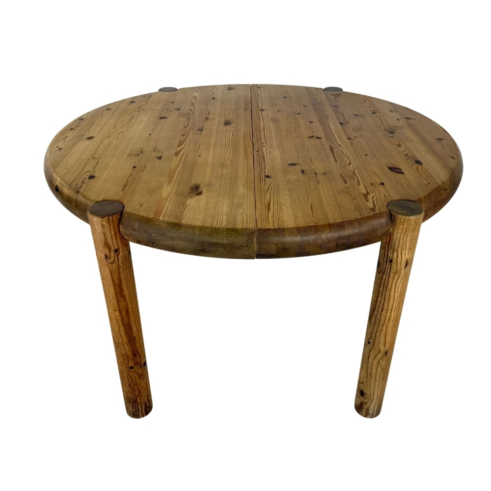 RAINER DAUMILLER EXTENDABLE DINING TABLE: Dimensions: H 27.7” x W 50”. Pine round extendable dining table by Rainer Daumiller, 1970s. Dimensions: (extended) W 75".