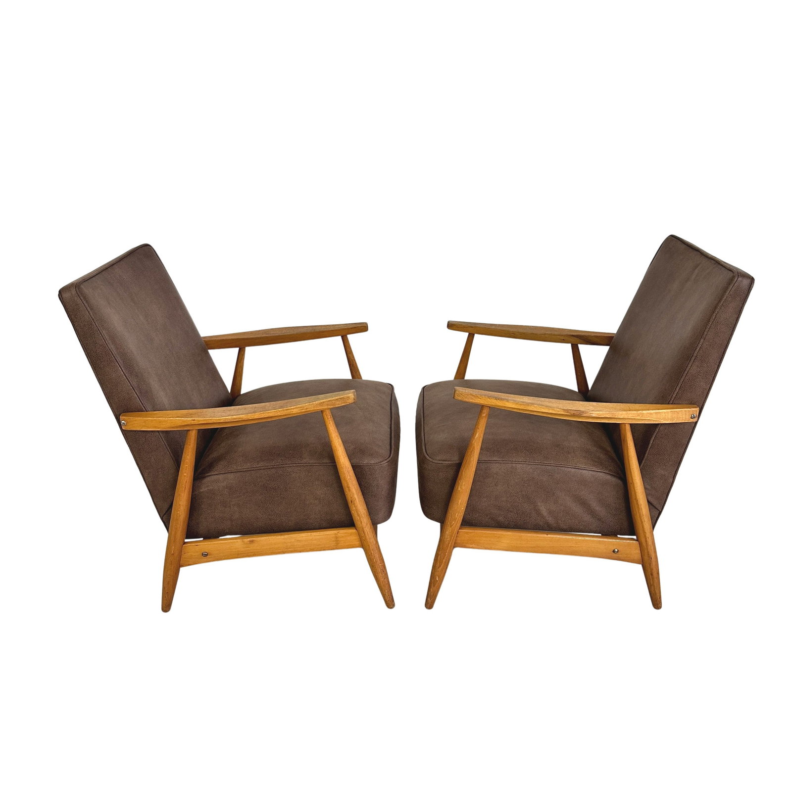 DANISH LOUNGE CHAIRS MANNER OF HANS WEGNER, A PAIR: Dimensions: H 31.5” x W 26.7” x D 25” x SH 17.7”. Pair of Vintage Danish lounge chairs manner of Hans Wegner newly upholstered in brown faux leather.