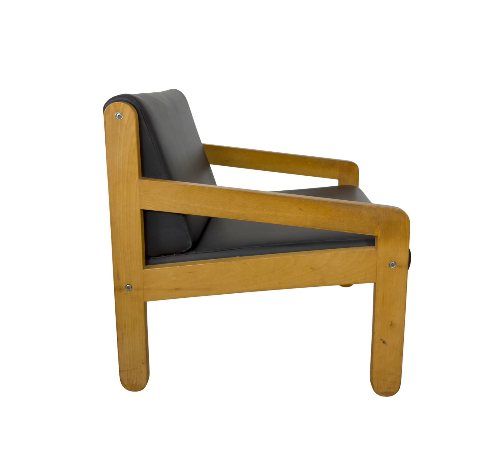VINTAGE DANISH ARMCHAIR: Dimensions: H 28.5” x W 25” x D 28.5” x SH 16”. Vintage Danish armchair newly upholstered in black faux leather.