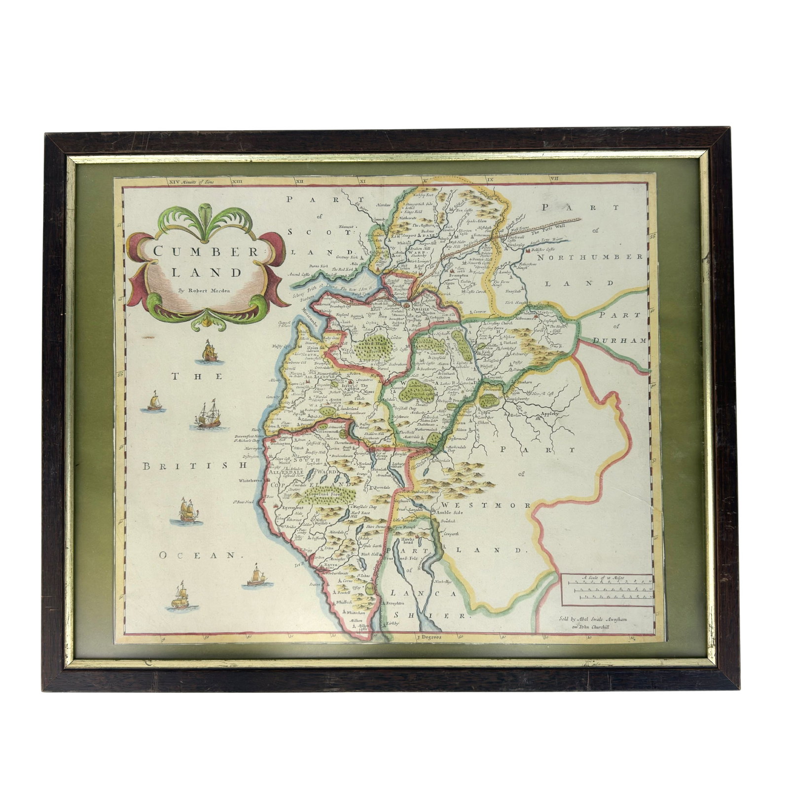 ANTIQUE MAP OF CUMBERLAND BY ROBERT MORDEN: Dimensions: H 17.3” x W 21”. Antique framed map of Cumberland (now Cumbria) produced by cartographer Robert Morden.