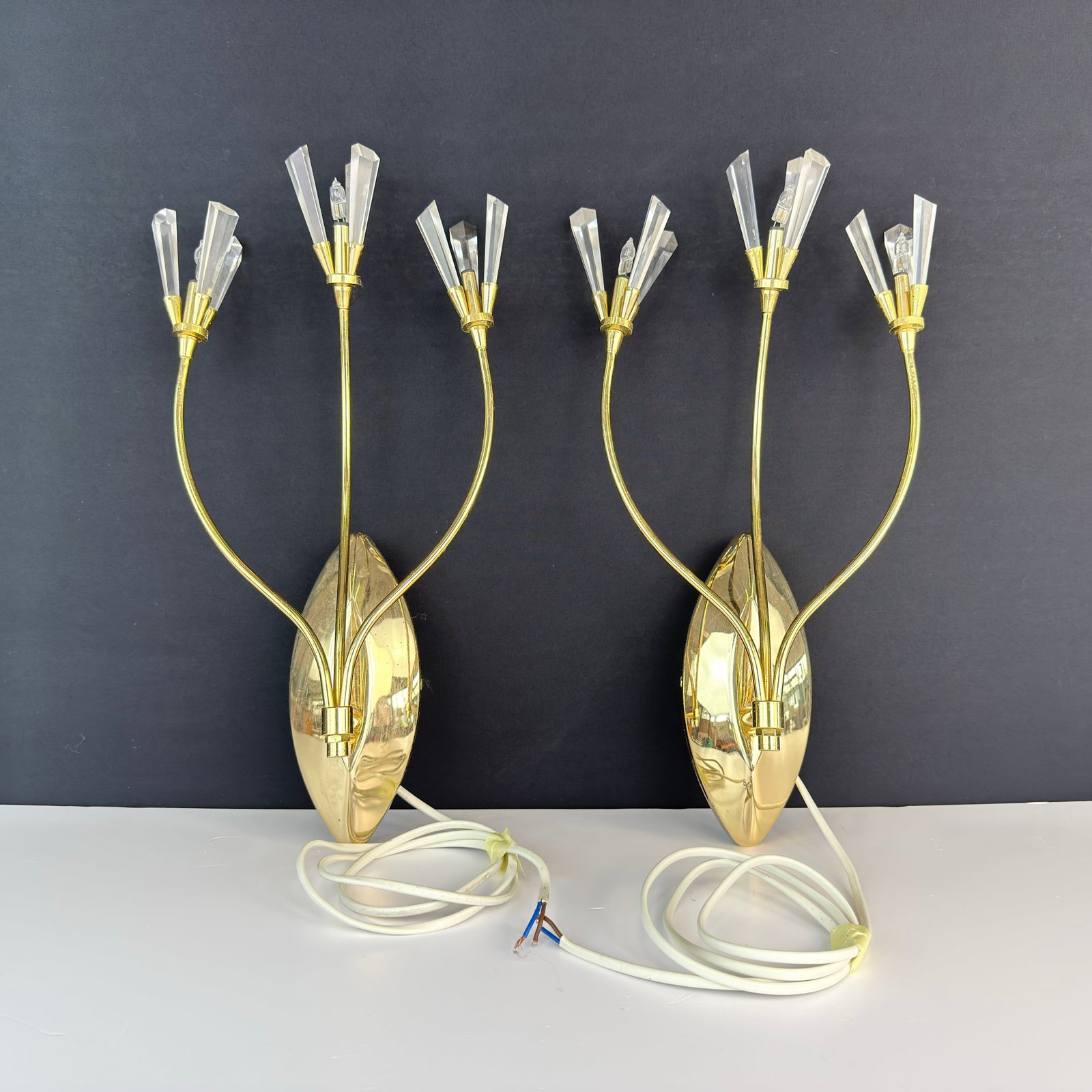 SPANISH WALL SCONCES, A PAIR: Dimensions: H 17” x W 3”. Pair of Vintage Spanish wall sconces by Luzberfont S.L., each one with 3 lights.