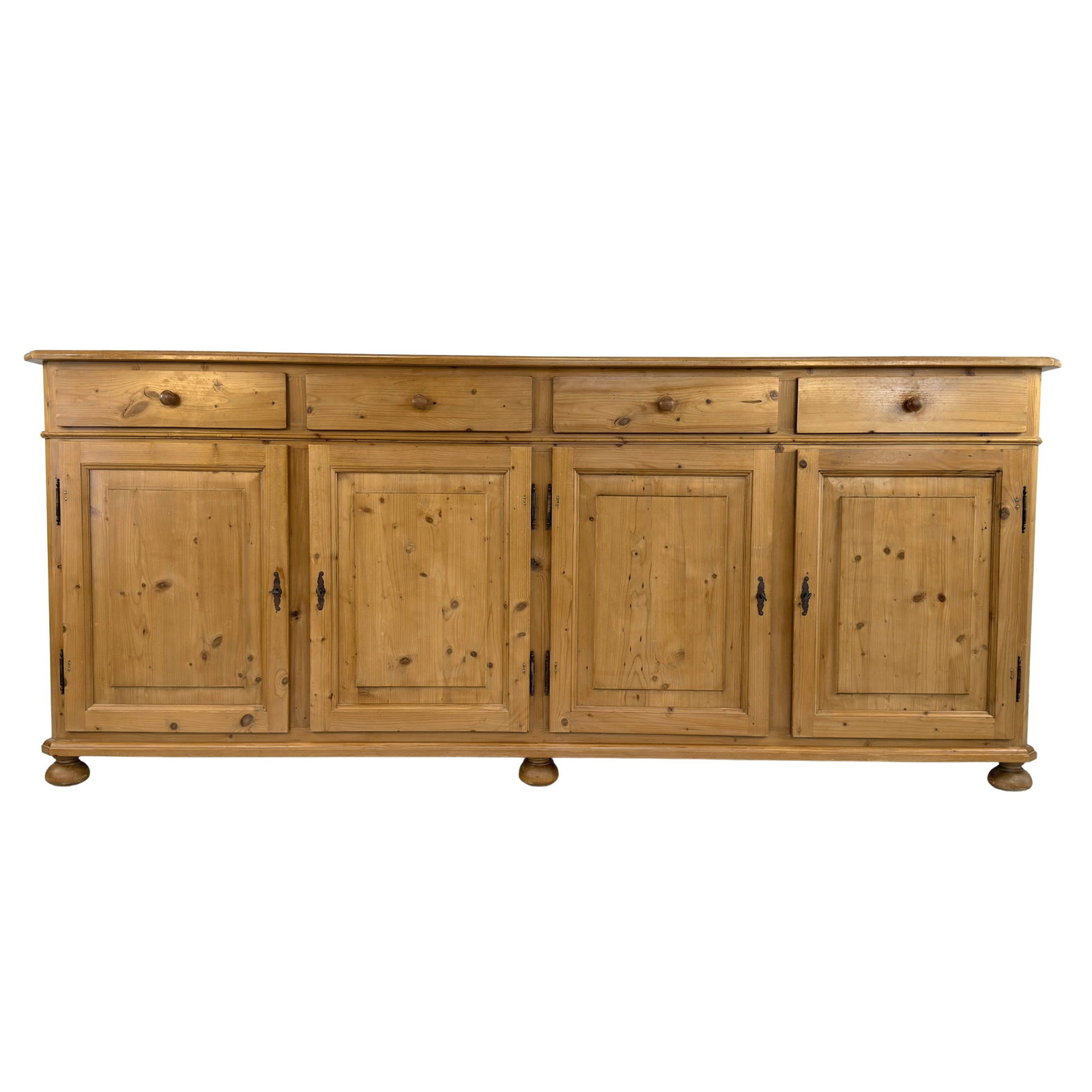 VINTAGE PINE SIDEBOARD: Dimensions: H 43.5” x W 101.5” x D 22”. Vintage Scandinavian pine sideboard with 4 drawers and 4 cupboards with shelves inside.