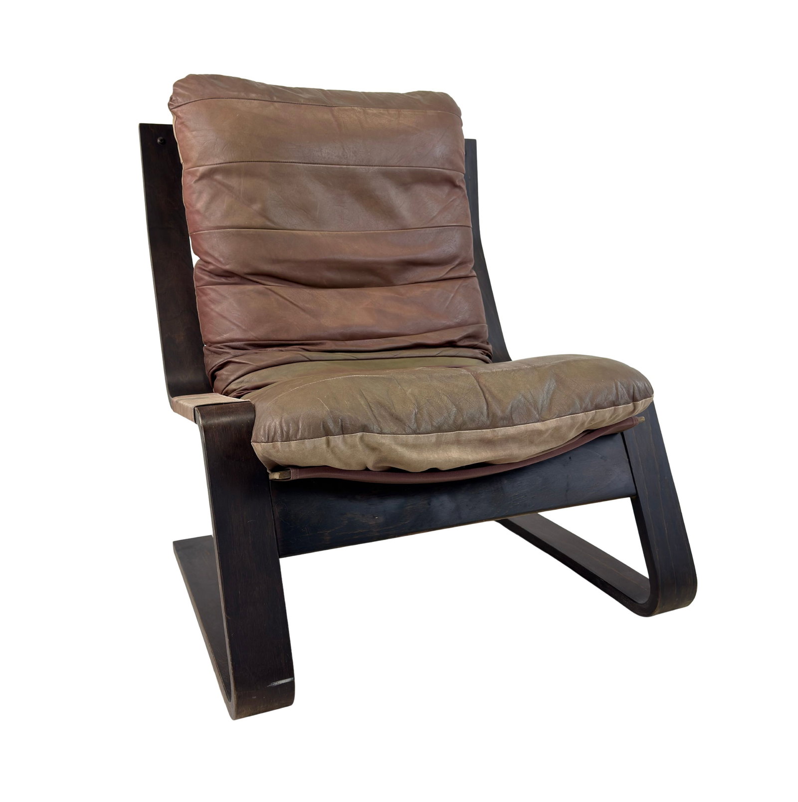 VINTAGE SCANDINAVIAN LOUNGE CHAIR: Dimensions: H 40” x W 31.5” x D 34” x SH 18”. Vintage Scandinavian bentwood lounge chair with original brown leather patchwork cushion.