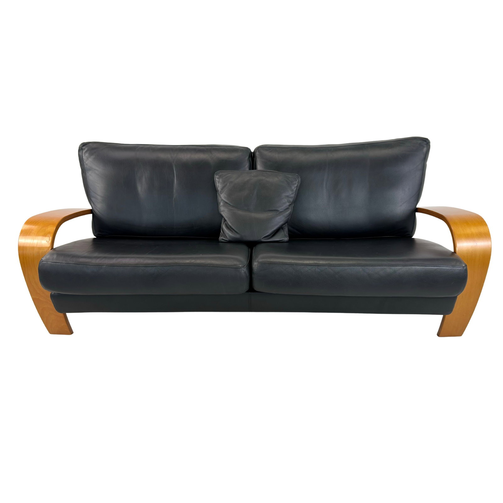 VINTAGE DESIGNER LEATHER SOFA: Dimensions: H 31” x W 76.3” x D 34.5” x SH 17”. Vintage European designer black leather sofa with wooden curved armrest, designed in the 1990s, possibly Belgium.