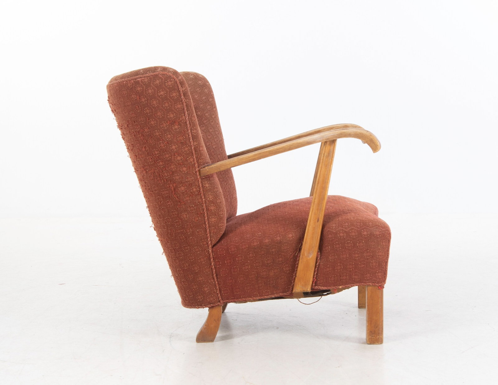 DANISH EASY CHAIR, 1940s: Dimensions: H 30.5” x W 26.75” x D 30”. Danish easy chair from 1940's with open carved armrests in oak. 0645