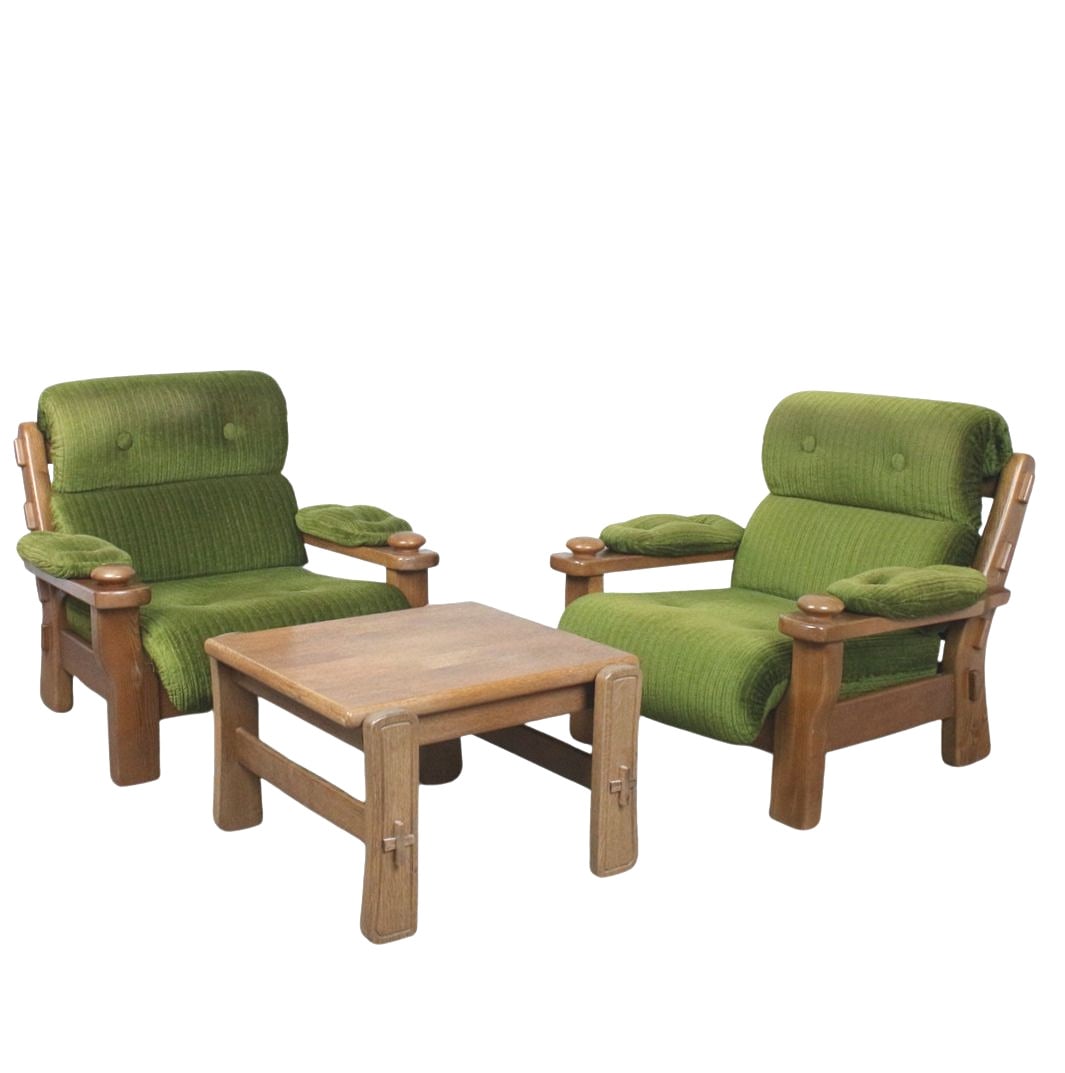 (2) BRUTALIST ARMCHAIRS WITH COFFEE TABLE, 1980s: Dimensions: H 33” x W 37.7” x D 33” x SH 16.1”. Pair of Vintage Brutalist oak lounge armchairs in original green fabric with Brutalist coffee table. Dimensions: (table) H