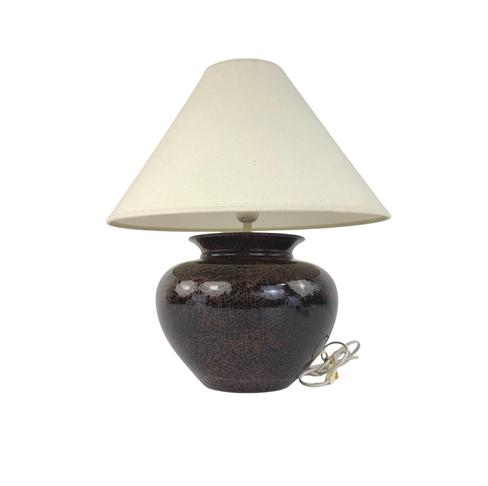 TABLE LAMP BY KORALCOA: Dimensions: H 13” x W 11”. Vintage table lamp by Koralcoa made in Portugal with black and brown crackle-glazed ceramic base and light brown fabric lampshade. Dimensions are for the base.