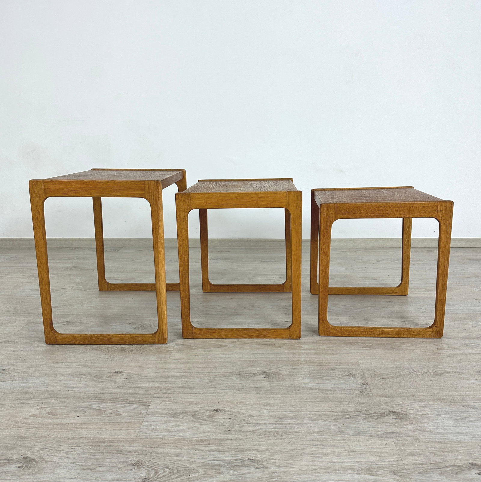 (3) NESTING TABLES BY REX RAAB: Dimensions: H 20.5” x W 22.7” x D 15.5”. Set of 3 Vintage nesting tables by Rex Raab for Wilhelm Renz. Dimensions: H 19.3”/ H 18”.