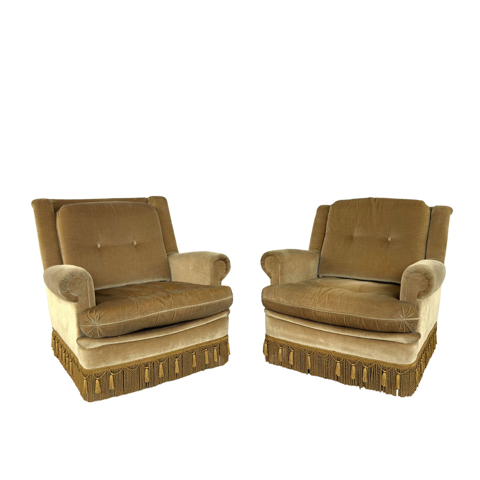EUROPEAN LOUNGE CHAIRS, A PAIR: Dimensions: H 33 ” x W 31 ” x D 38.5” x SH 18”. Pair of Vintage European His and Hers lounge chairs in original light brown soft fabric with fringes. Dimensions: (2nd) H