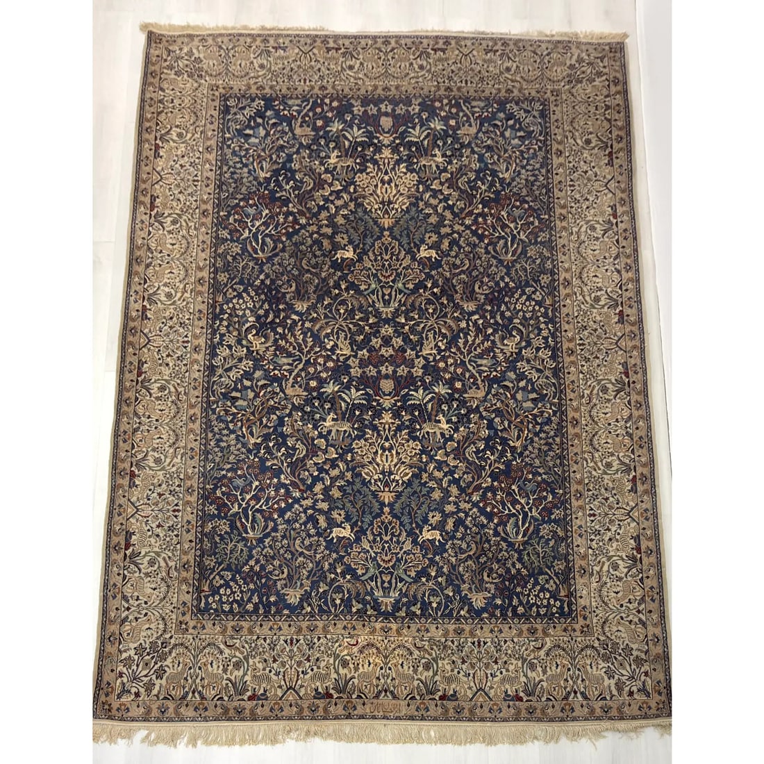 FINE SIGNED HAND-KNOTTED NAIN HABIBIAN RUG: Dimensions: 10?3? x 7?1?. Rare and fine Vintage Persian Nain Habibian wool on cotton rug with silk inserts. Signed.