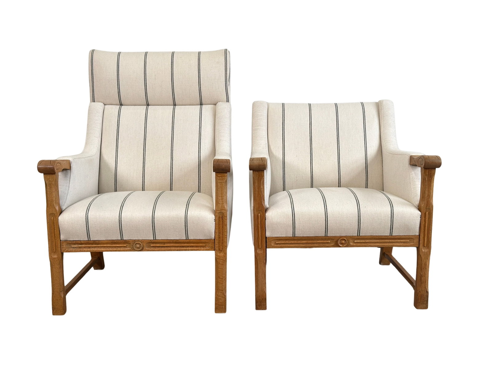 HENNING KJAERNULF LOUNGE ARMCHAIRS, A PAIR: Dimensions: H 38.9” x W 26.3” x D 29.1” x SH 15.7”. Pair of Vintage His and Hers oak lounge chairs by Henning Kjaernulf, reupholstered in cream linen with stripes. Dimensions: 