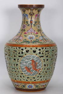 Qianlong period , enamel colored bean green hollow fish vase with gold tracing: Qianlong period , enamel colored bean green hollow fish vase with gold tracing, height 41.8 cm, diameter 13 cm, belly diameter 25.5 cm, bottom diameter 12.3 cm.