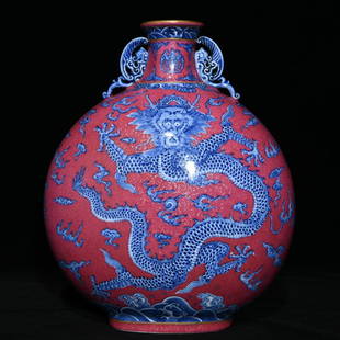 Qianlong rouge ground blue and white dragon pattern flat vase: Qianlong rouge ground blue and white dragon pattern flat vase, height 30cm and diameter 25cm