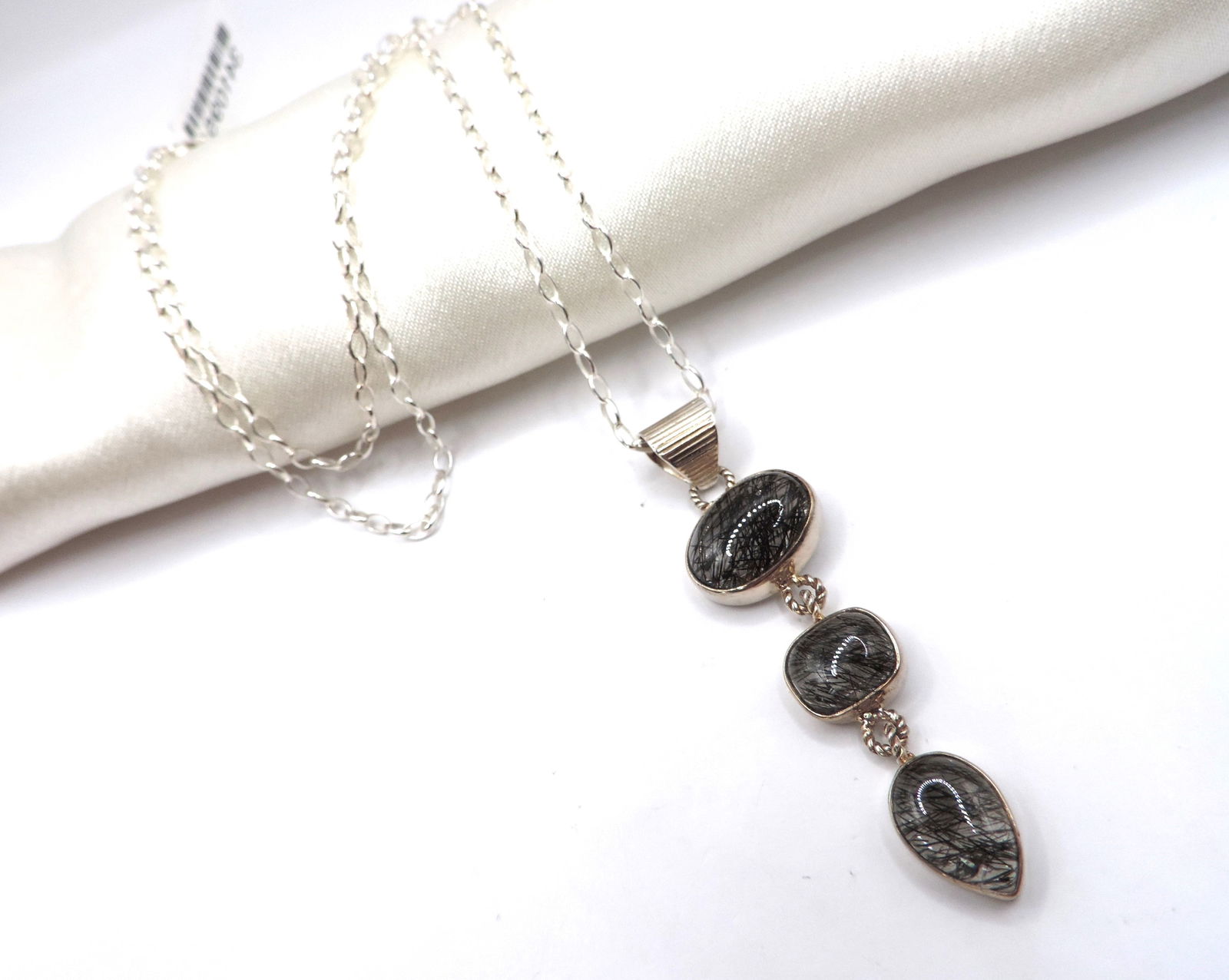 Sterling Silver Cabochon Moss Agate Pendant Necklace New with Gift Box. A sterling silver pendant se: Sterling Silver Cabochon Moss Agate Pendant Necklace New with Gift Box. A sterling silver pendant set with Cabochon Moss Agate gemstones - 13x9mm 12x8mm & 9x9mm. The pendant has a 5.5cm drop and is on