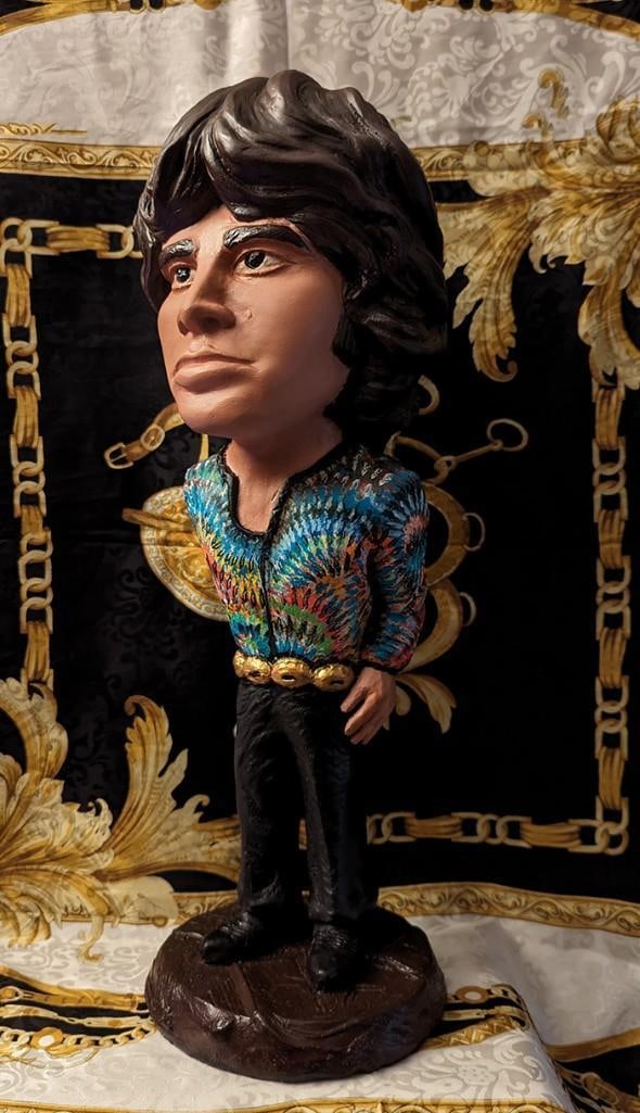 The Doors: Jim Morrison Hand-Crafted 17" Statue By Sculptor Ron Marko: Scarce sculpture capturing the iconic Jim Morrison, frontman of The Doors. Standing at 17 inches and weighing 10 pounds, this statue, created by sculptor Ron Marko, is ana mazing example to Morri