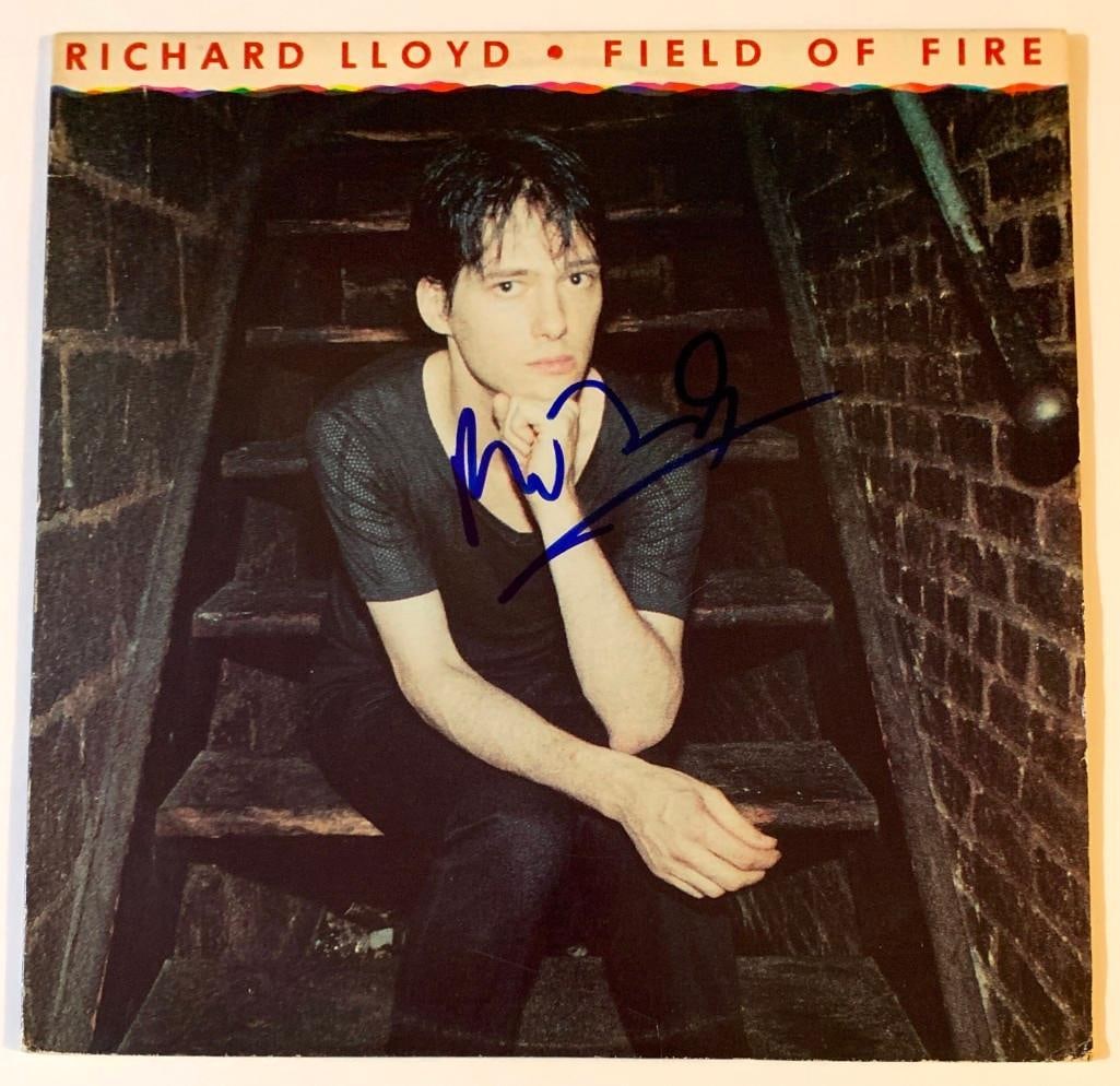 Television: Richard Lloyd In-Person Signed "Field of Fire" Album (JSA Authentication): Television's Richard Lloyd Signed "Field of Fire" Album. In very good condition, with some scattered wear. Record is included. Accompanied by JSA Authentication. Obtained in-person.