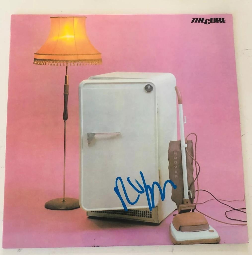 The Cure: Robert Smith In-Person Signed "Three Imaginary Boys" Album (Beckett/BAS Authentication): "Three Imaginary Boys" album signed IN-PERSON on the cover in crisp and clean blue paint pen by The Cure's Robert Smith. In fine condition Vinyl is included. Accompanied by Beckett