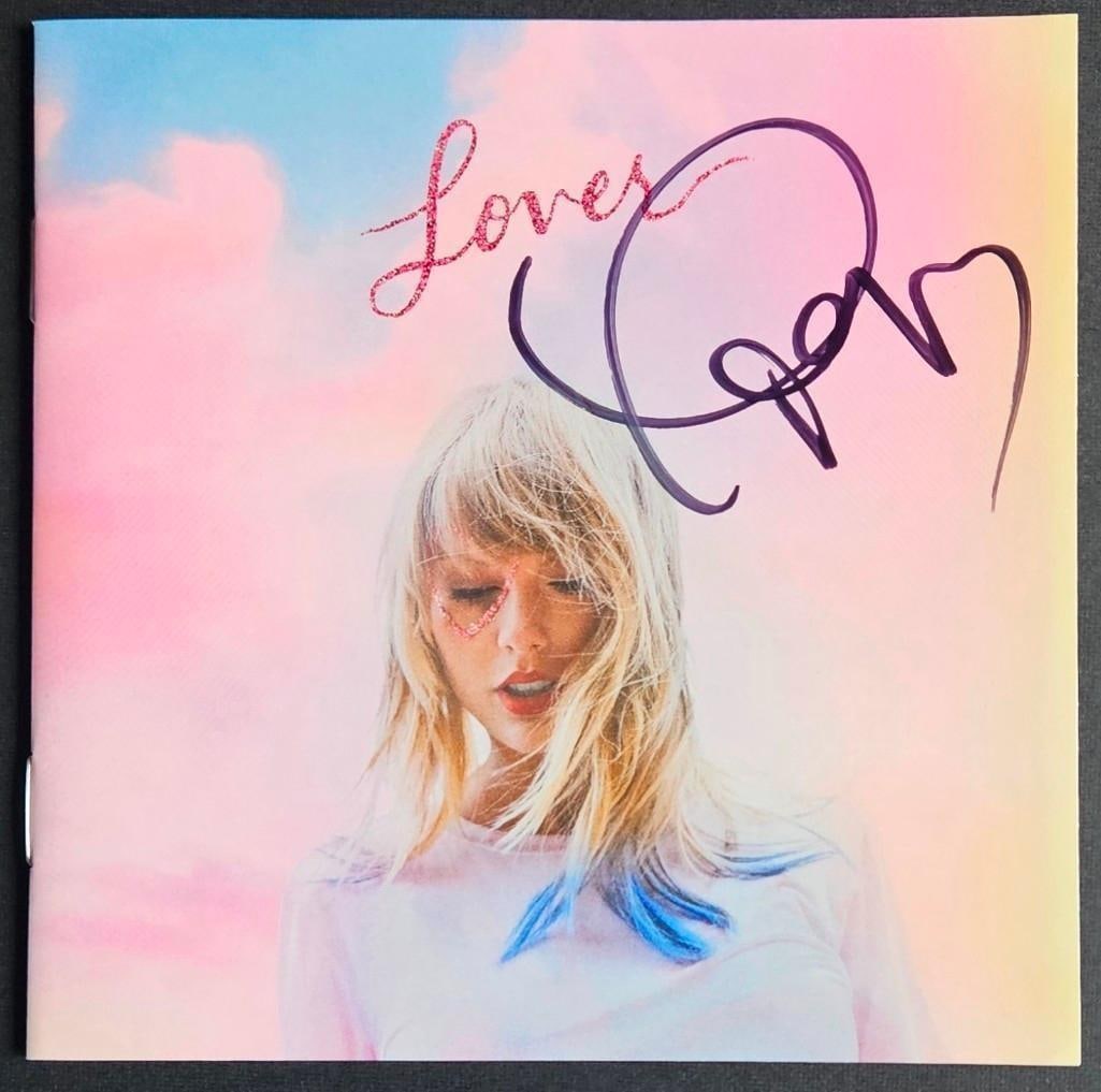 Taylor Swift Signed "Lover" CD Cover (Third Party Guaranteed): "Lover" CD signed on the booklet cover in black felt tip marker by Taylor Swift. In fine condition. CD is not included. Originally purchased from Swift's website as part of her promotional pre-sa