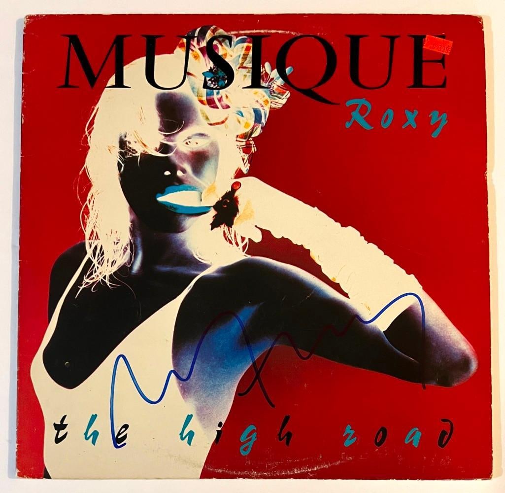 Roxy Music: Bryan Ferry Signed "The High Road" Album (Beckett/BAS Authentication): “The High Road” album signed on the cover in felt marker tip by Bryan Ferry. In very good condition, with some scattered wear. Record is included. Accompanied by a Beckett/BAS Au