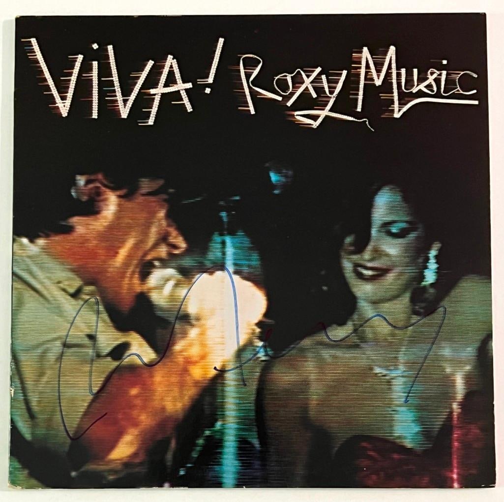 Roxy Music: Bryan Ferry Signed "Viva" Album (Beckett/BAS Authentication): "Viva" album signed on the cover in blue felt tip marker by Bryan Ferry. In fine condition. Record is included. Accompanied by a Beckett/BAS cert.