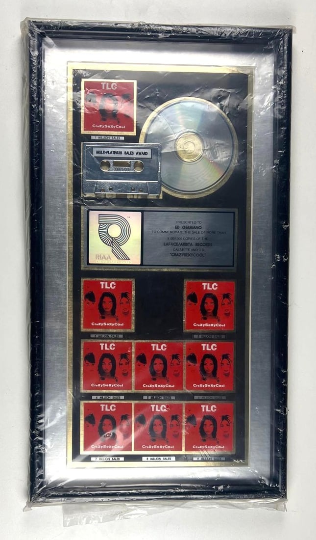 TLC "CrazySexyCool" RIAA Multi-Platinum Album Sales Award Presented to The Hit Factory: RIAA Certified Multi-Platinum Sales Award presented to The Hit Factory, commemorating the sale of over 9,000,000 copies of TLC's album "CrazySexyCool." The framed display measures approximat
