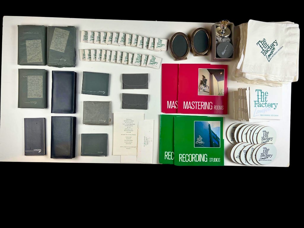Hit Factory London Archive with Branded Ephemera, Concorde Memorabilia, and Opening Party Photos: Archive from the Hit Factory London Recording Studios, capturing the golden era of recording in the early 1990s. This extensive collection, housed in a small plastic storage tub provides a time c
