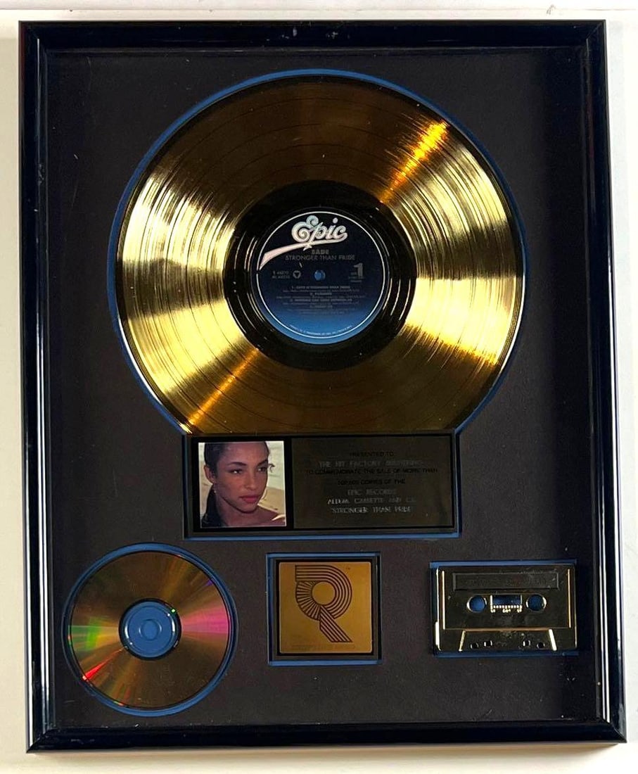 Sade "Stronger Than Pride" RIAA Gold Album Sales Award Presented to The Hit Factory: This RIAA Certified Gold Album Sales Award, measuring 17" x 21", is presented to The Hit Factory to commemorate the sale of more than 500,000 copies of Sade's iconic album Stronger Than Pride, re