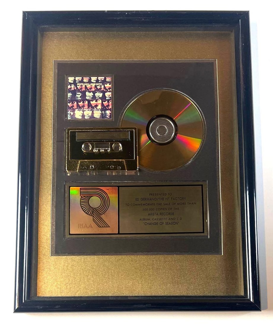 Hall & Oates "Change of Season" RIAA Gold Sales Award Presented to The Hit Factory: RIAA Gold Sales Award presented to Ed Germano / The Hit Factory, commemorating the sale of more than 500,000 copies of the Arista Records album, cassette, and CD 'Change of Season' by Daryl Hall and J