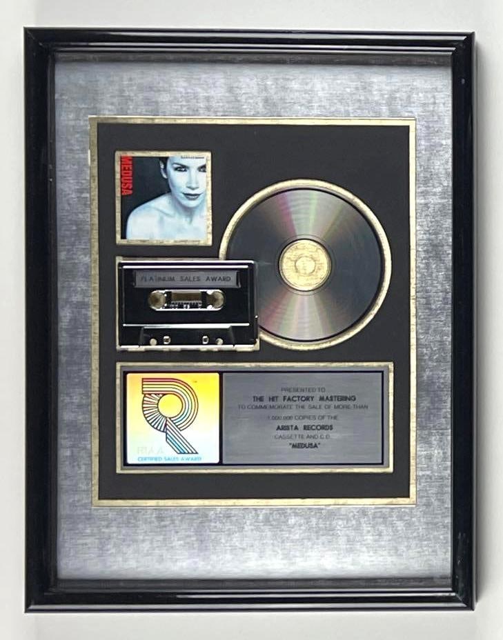 Annie Lennox "Medusa" RIAA Platinum Sales Award Presented to The Hit Factory Mastering: This is an RIAA Certified Platinum Sales Award presented to The Hit Factory Mastering to commemorate the sale of more than 1,000,000 copies of the Arista Records cassette and CD "Medusa." The award fe