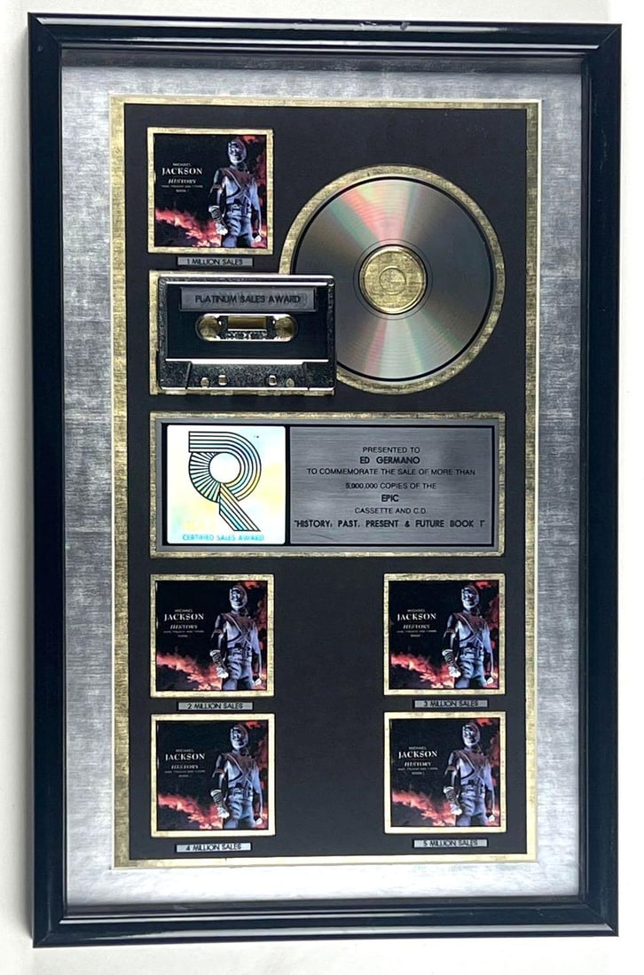Michael Jackson “HIStory: Past, Present and Future” RIAA Platinum Sales Award to Ed Germ (1 of 2)
