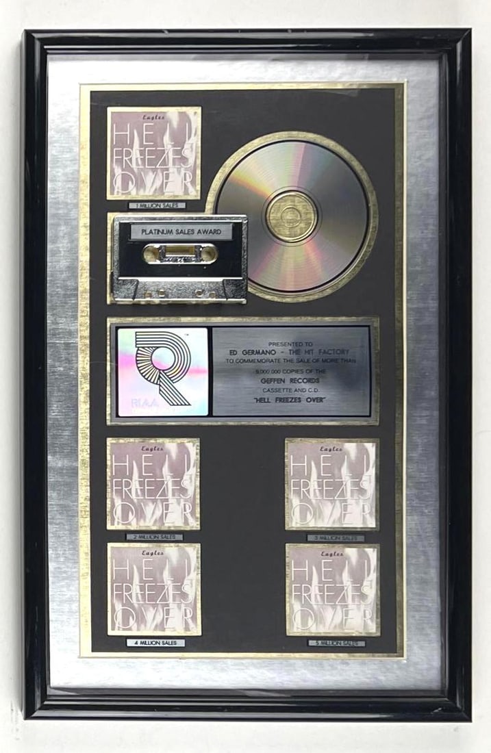 Eagles “Hell Freezes Over” RIAA Platinum Album Sales Award Presented to The Hit Factory: This RIAA Certified Platinum Sales Award was presented to Edward Germano/The Hit Factory to commemorate the sale of more than 5,000,000 copies of the Geffen Records cassette and CD Hell Freezes O