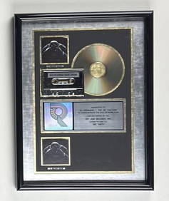 LL Cool J “Mr. Smith” RIAA Multi-Platinum Album Sales Award Presented to The Hit Factory (1 of 2)