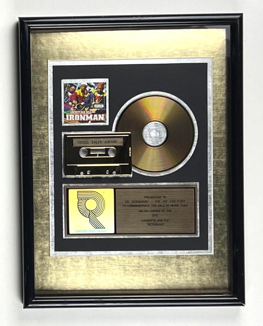 Ghostface Killah “Ironman” RIAA Gold Album Sales Award Presented to The Hit Factory: This RIAA Gold Sales Award, presented to Ed Germano and The Hit Factory, commemorates the sale of more than 500,000 copies of Ghostface Killah's *Ironman* album across cassette and CD formats. Featuri