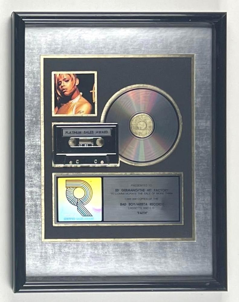 Faith Evans "Faith" RIAA Platinum Album Sales Award Presented to The Hit Factory: RIAA Certified Platinum Sales Award presented to The Hit Factory to commemorate the sale of more than 1,000,000 copies of the Bad Boy/Arista Records album, cassette, and CD "Faith" by Faith Evans. Thi