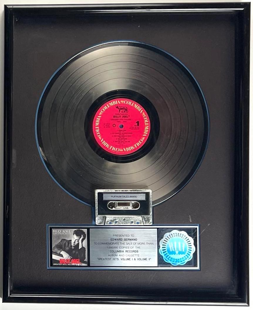 Billy Joel "Greatest Hits: Volume I & II" RIAA Platinum Sales Award Presented to Ed Germano (1 of 2)
