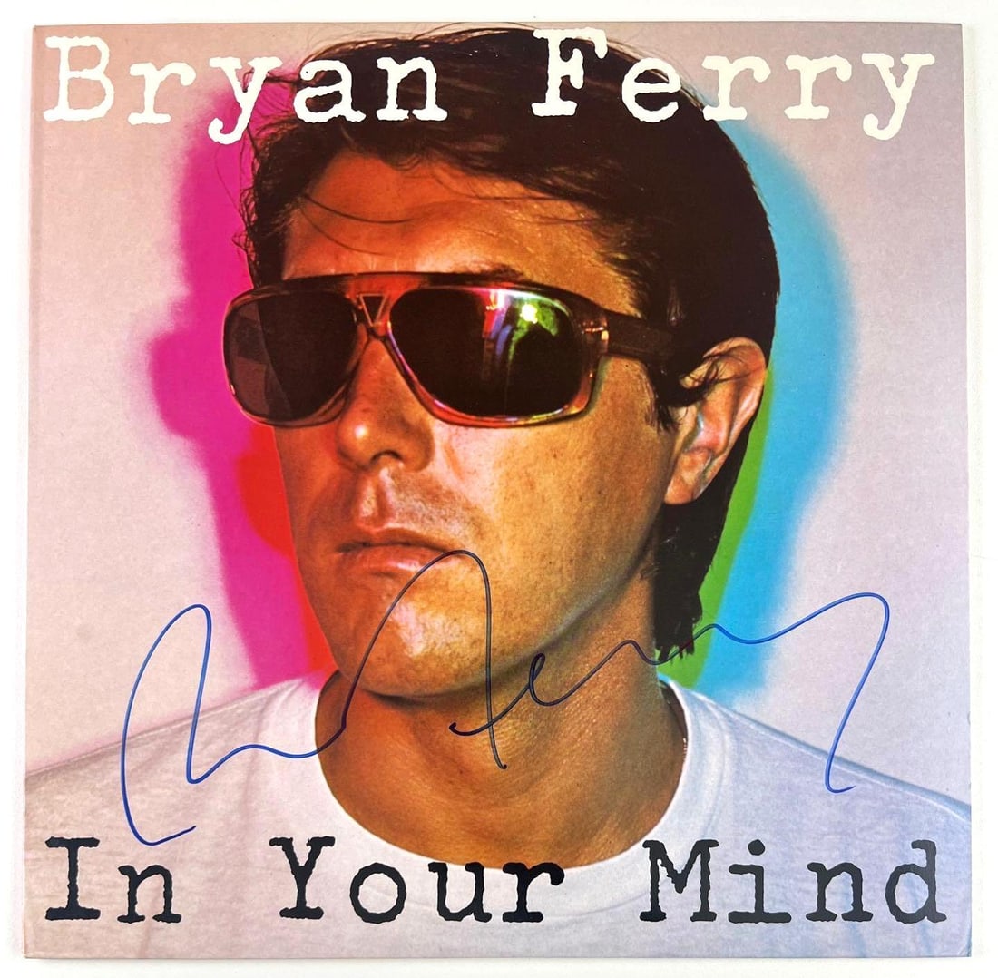 Roxy Music: Bryan Ferry In-Person Signed "In Your Mind" Album (BAS): "In Your Mind" album signed in blue felt tip marker by Bryan Ferry. Released in 1977, this was Ferry’s first solo album consisting entirely of original material, featuring the tracks "This