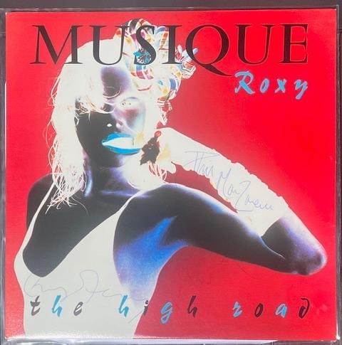 Roxy Music: Bryan Ferry & Phil Manzanera Signed "Musique" Album (Third Party Guaranteed): "Musique" promotional album signed on the cover in ink by Roxy Music member Bryan Ferry Phil Manzanera. The record features live recordings from their 1982 performance at the Apollo The