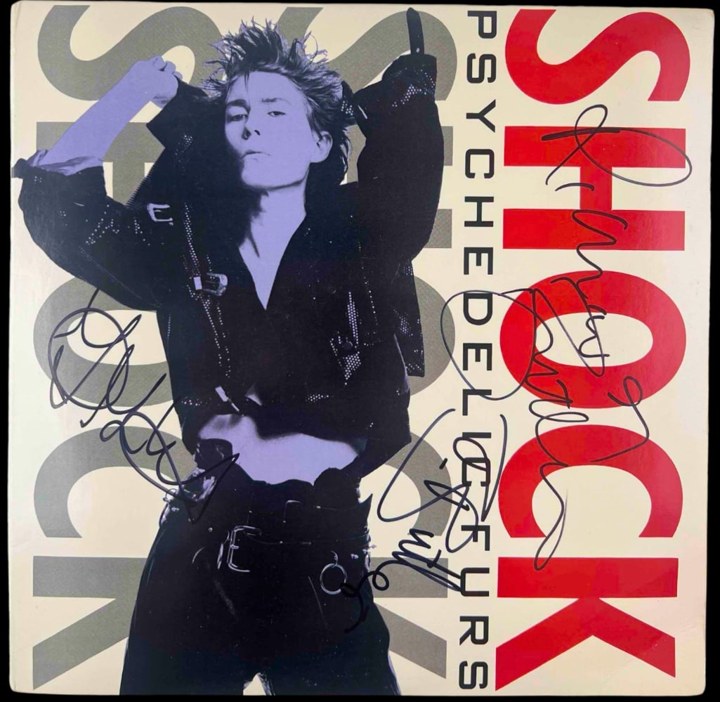 Psychedelic Furs Fully Group In-Person Signed "Shock" Album Cover (3 Sigs) (JSA Authentication): "Shock" album cover fully signed in black felt tip marker by all three members of the Psychedelic Furs: Richard Butler, Tim Butler, and John Ashton. In very good condition, with some signs of sca