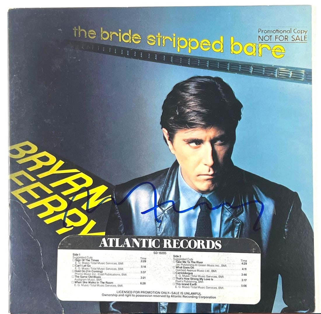 Bryan Ferry In-Person Signed "The Bride Stripped Bare" Album (Beckett/BAS Authentication): "The Bride Stripped Bare" album signed on the cover in blue felt tip marker by Bryan Ferry. In very good condition, with some signs of scattered wear. Record is included. Obtained in-person. Accompani