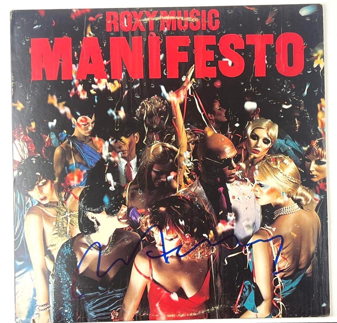 Roxy Music: Bryan Ferry In-Person Signed "Manifesto" Album (Beckett/BAS Authentication): "Manifesto" album signed on the cover in blue felt tip marker by Roxy Music frontman Bryan Ferry. In very good condition, with some signs of scattered wear. Record is included. Obtained in-person. Acc